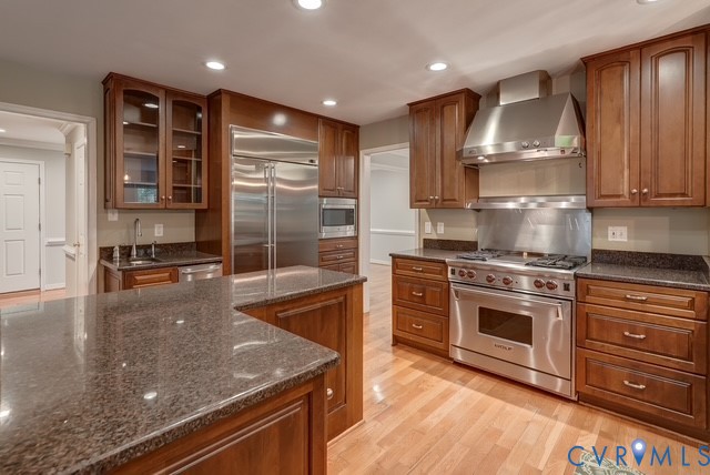 Stunning cabinets with glowing stainless steal appliances