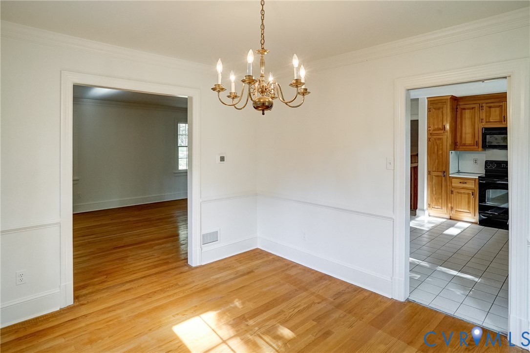 Dining room open to living room and kitchen