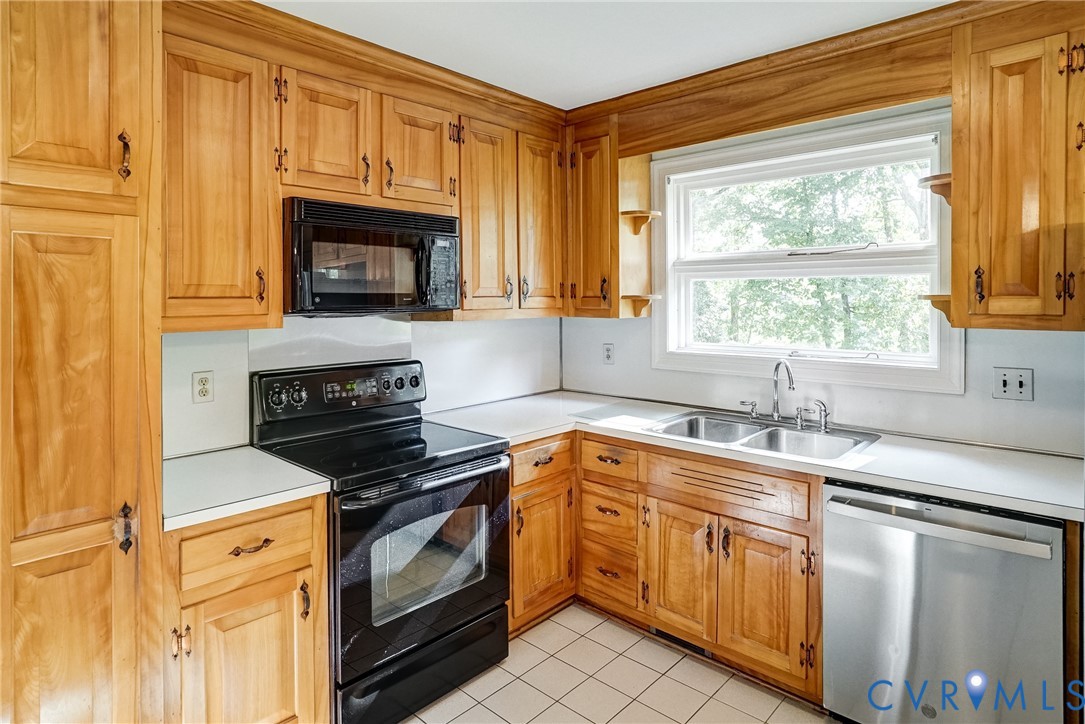 Another kitchen view.  Window over sink overlooks private backyard.