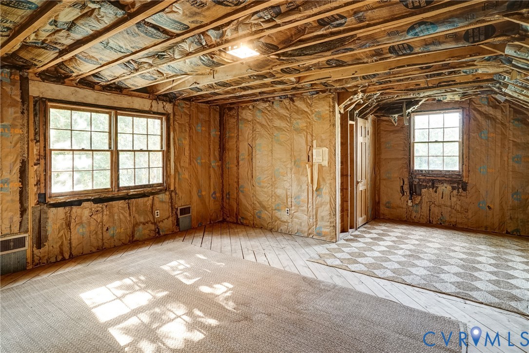 Tons of potential in this space.  Separate primary suite, 4th bedroom, additional living space??