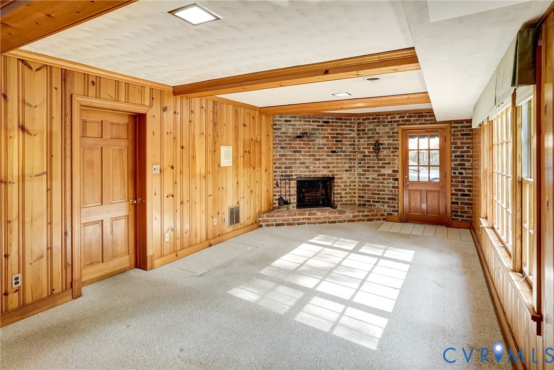 Another family room view.  Access to garage and access to side driveway.