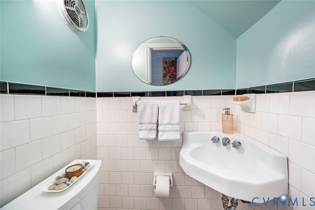 First floor powder room with upgraded comfort height toilet