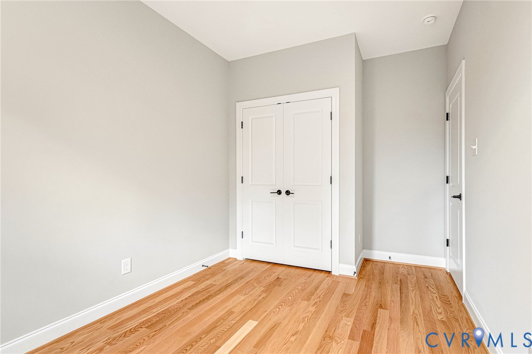 Hardwood flooring and light-toned walls