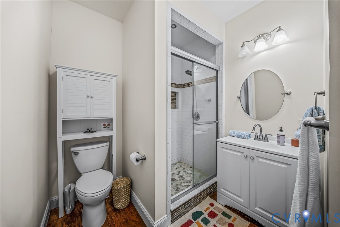 Bathroom with walk-in closet