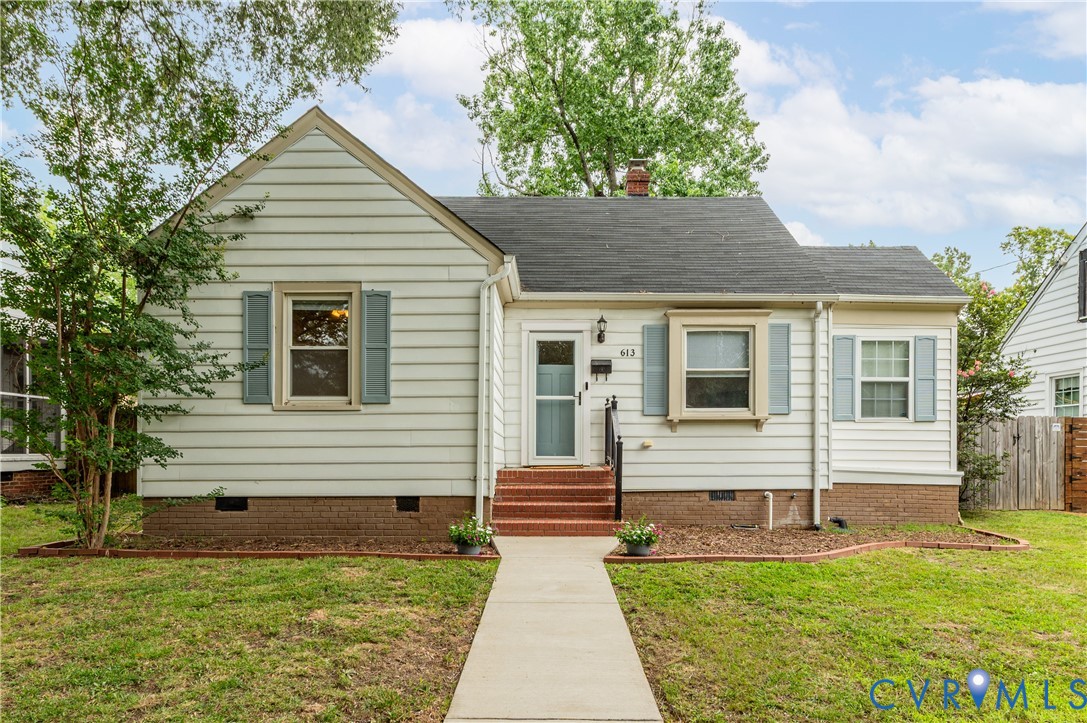 White horizontal siding exterior with contrasting blue shutters White horizontal siding exterior with contrasting blue shutters