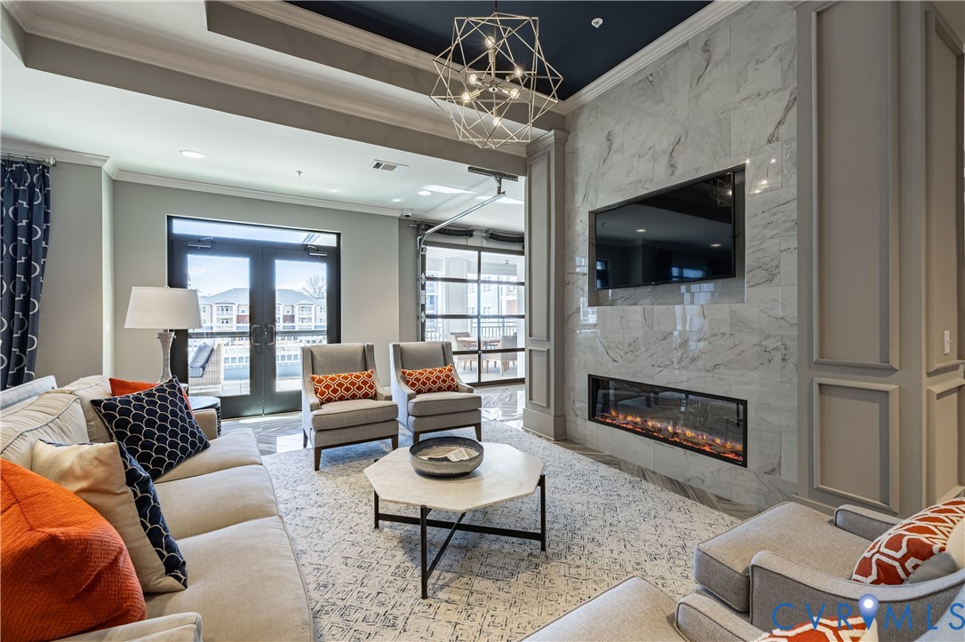 Marble-patterned accent wall with an integrated linear fireplace
