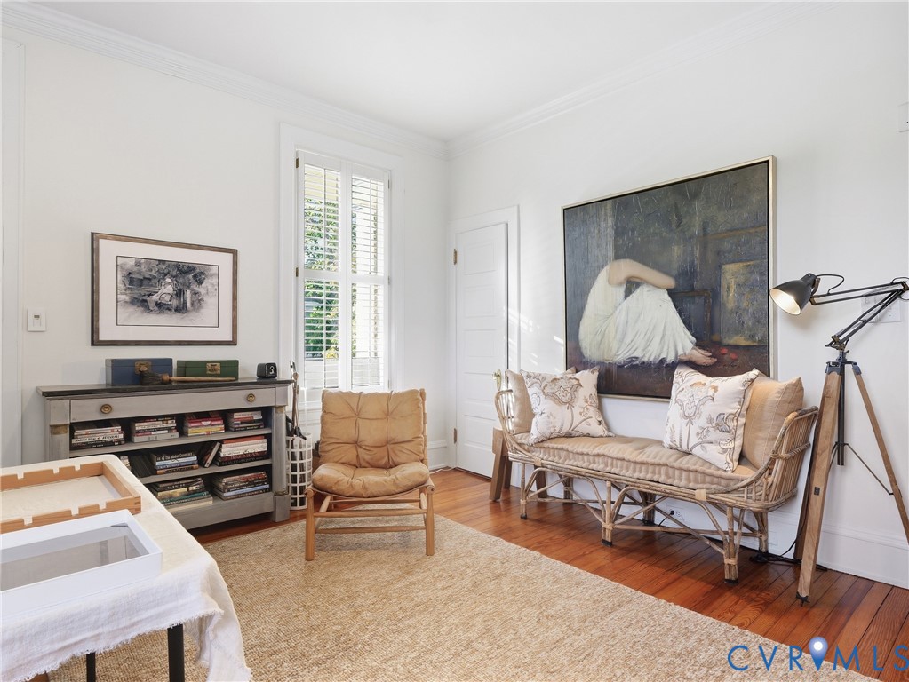 Currently used as an art studio, a well proportioned bedroom with door to covered balcony.