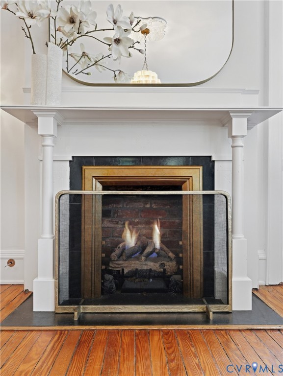 Functional gas fireplace in double parlor.