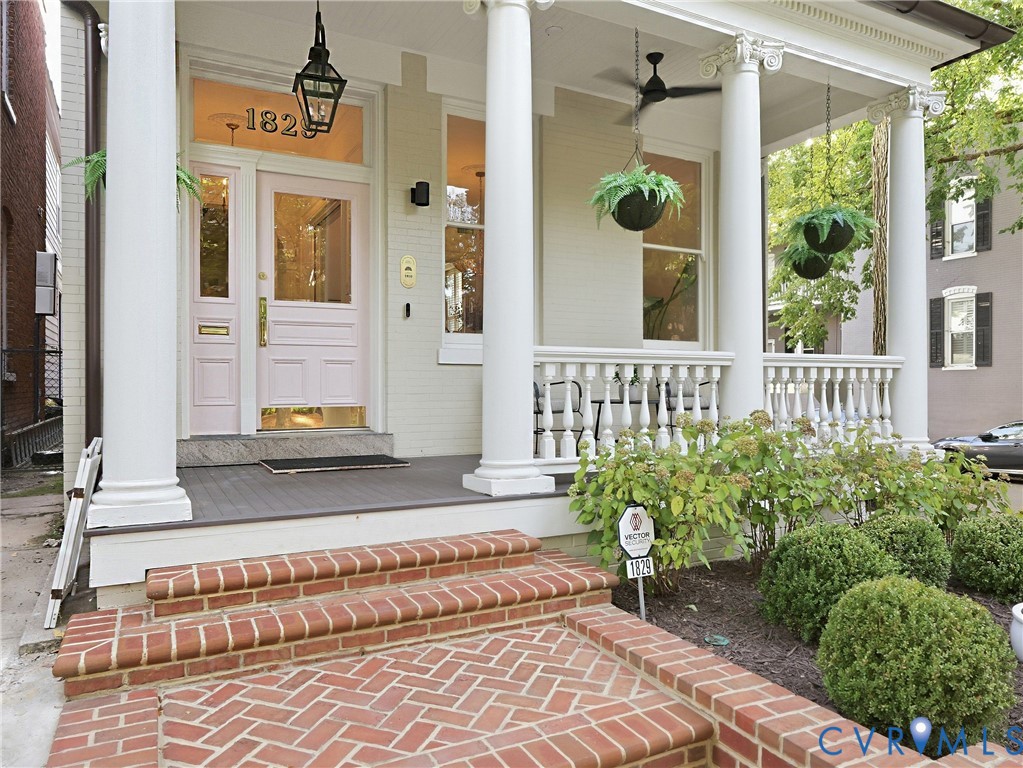 Trex porch, standing seam metal roof, and repointed brick steps