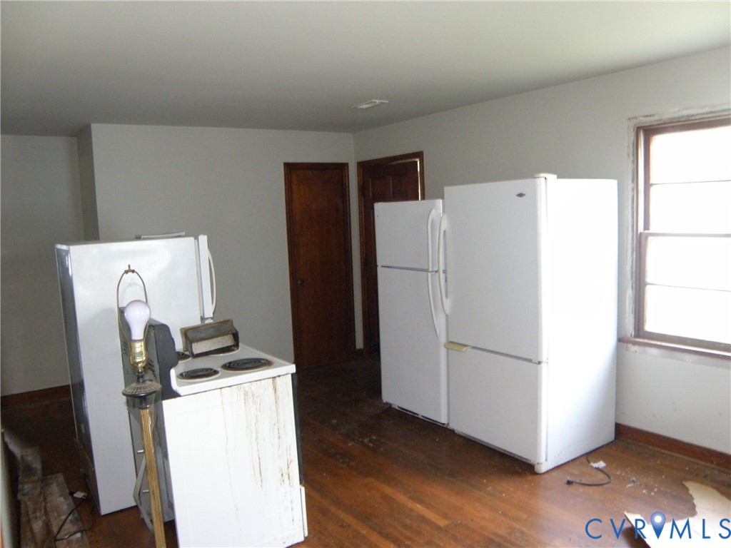 Bright and sunny room. Components of kitchen. Bright and sunny room. Components of kitchen.