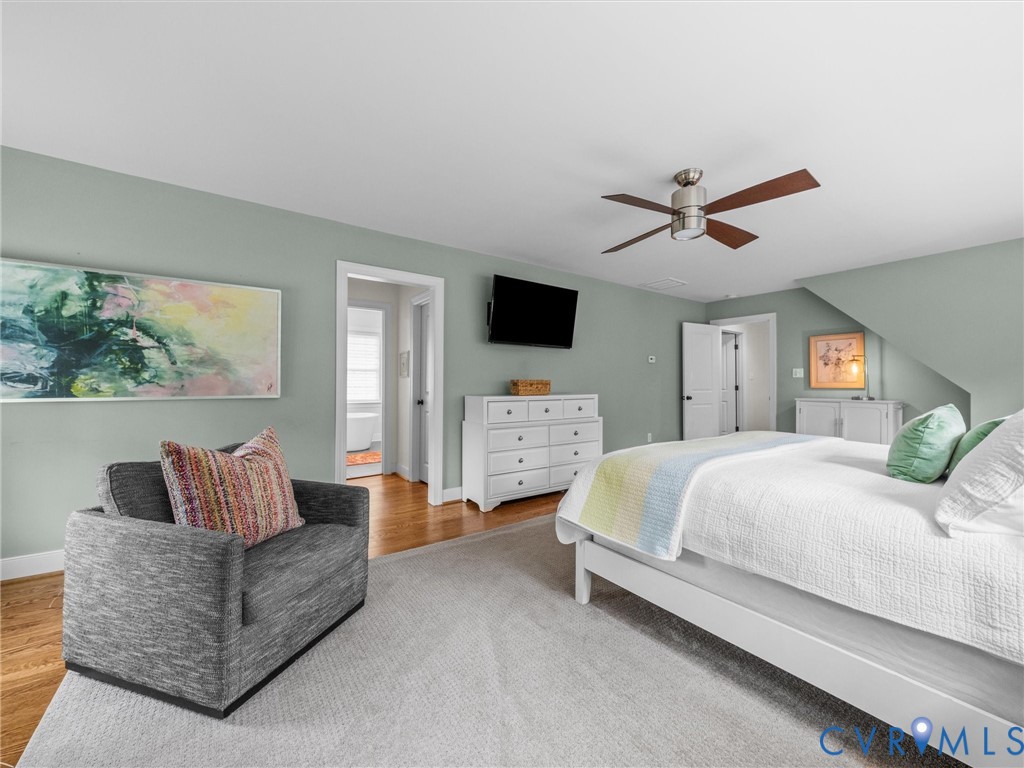 Recessed lighting, wood-finish flooring, ceiling fan, and sloped ceiling