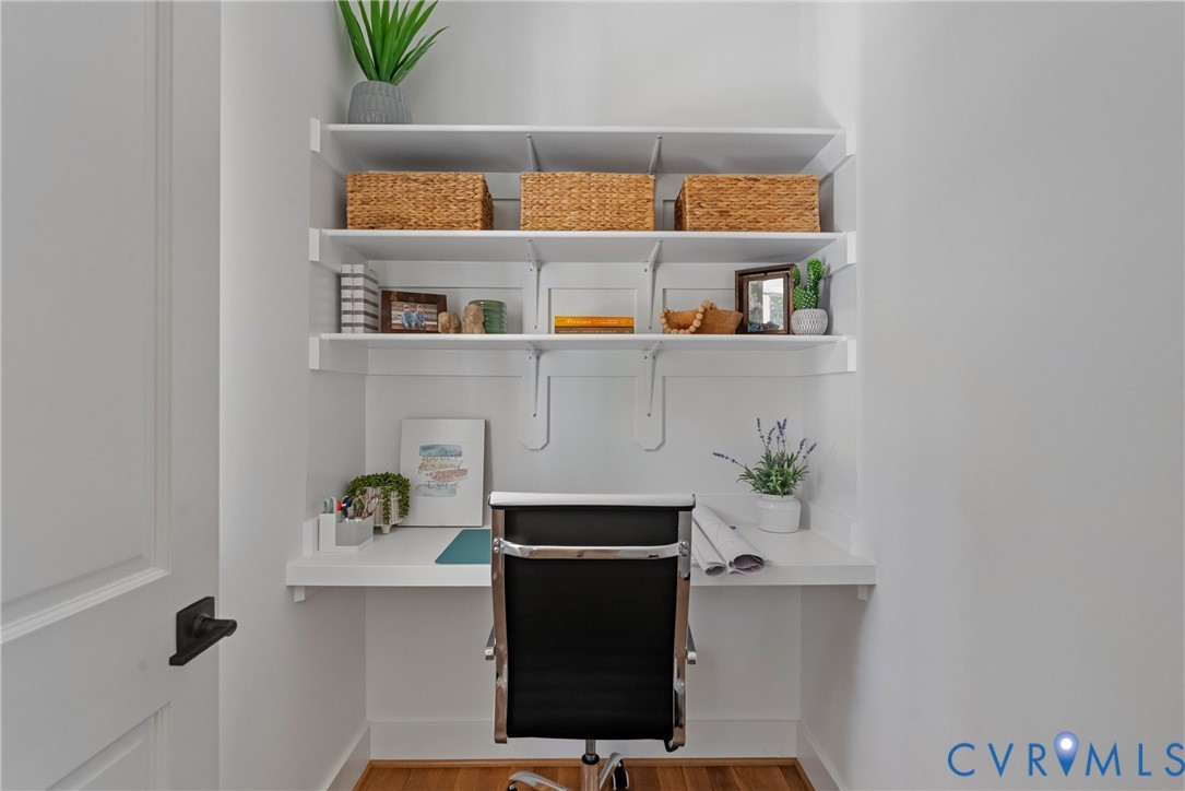 Built-in desk with integrated shelving, providing functional workspace and storage