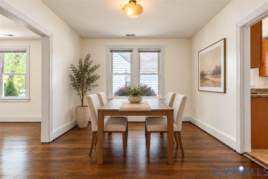 Hardwood flooring throughout, recessed window, and a built-in light fixture