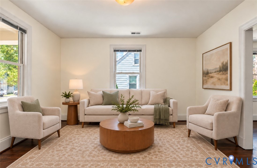 Hardwood flooring throughout, neutral wall tones, and overhead lighting