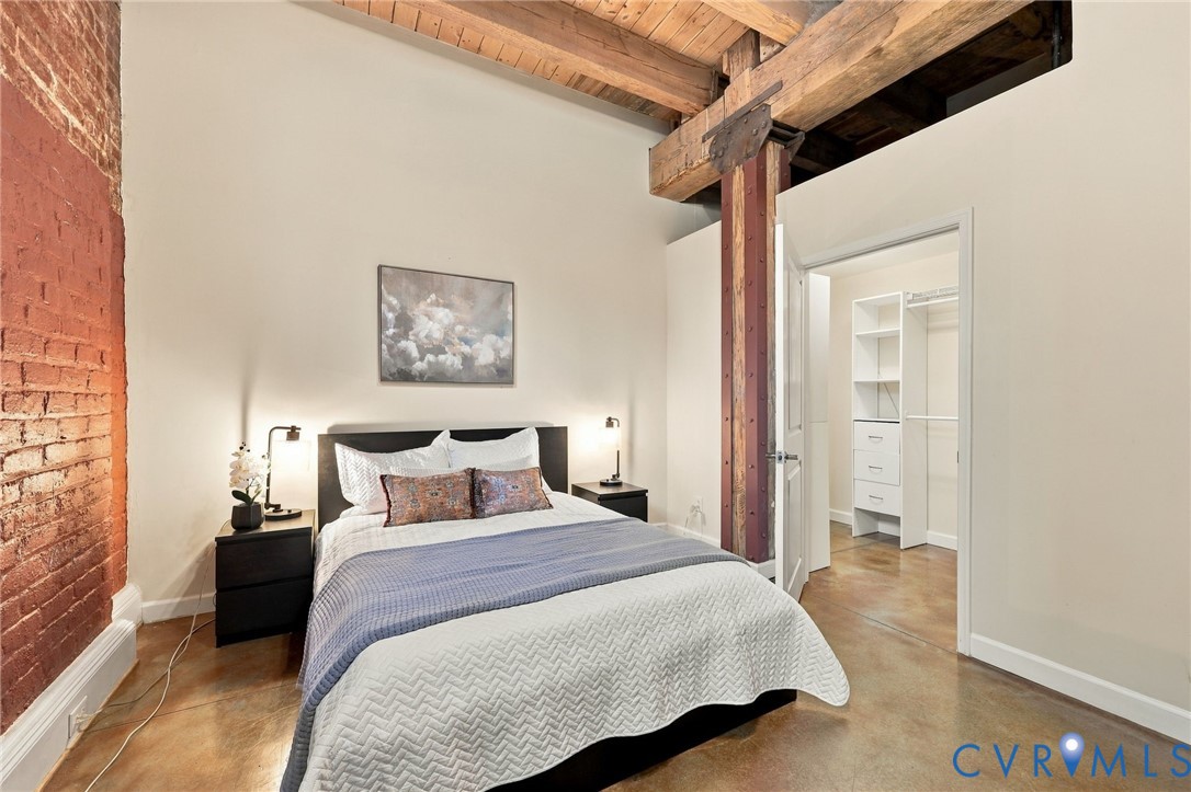 Large primary bedroom with walk-in closet.