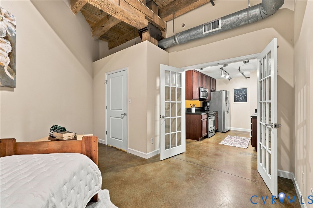 Connect to the main room by french doors.