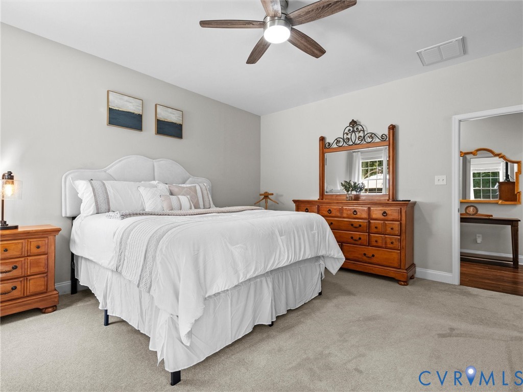 Wall-to-wall carpeting and neutral wall tones