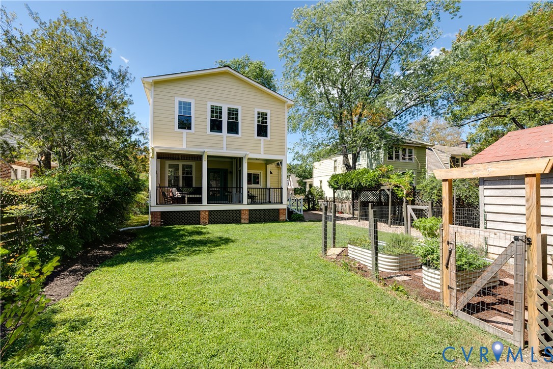 Yellow siding exterior with multiple windows