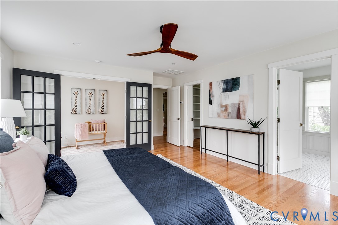 Hardwood flooring, recessed lighting, and a modern ceiling fan