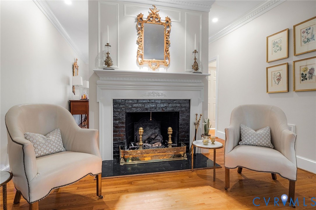 Fireplace is flanked by recently created openings to dining room Fireplace is flanked by recently created openings to dining room