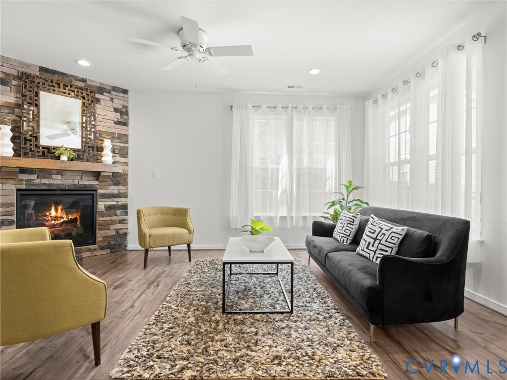 Abundant natural light and gas fireplace.
