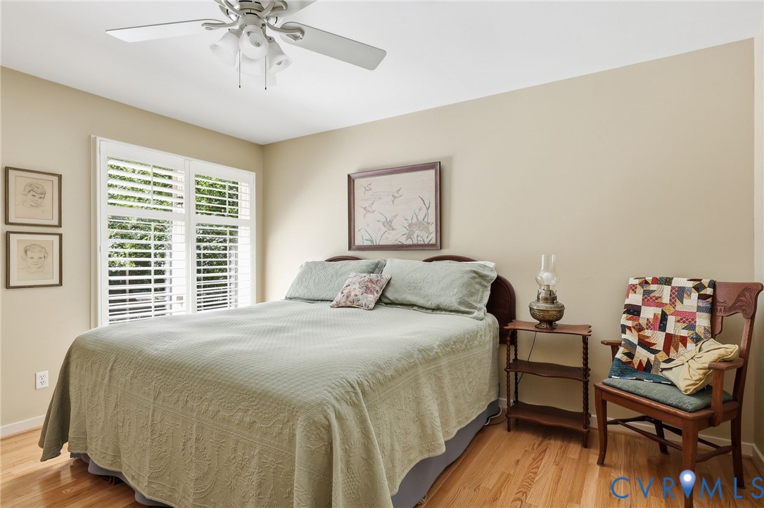 Bedroom 2 with ceiling fan and double closet