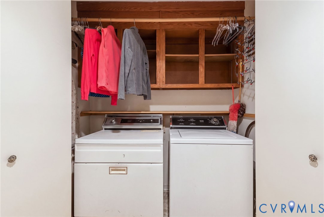 Conveniently located in hallway outside bedrooms.  Washer and Dryer convey.