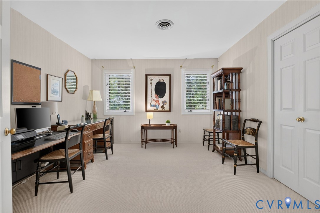 Flexible fourth bedroom currently used as a home office.