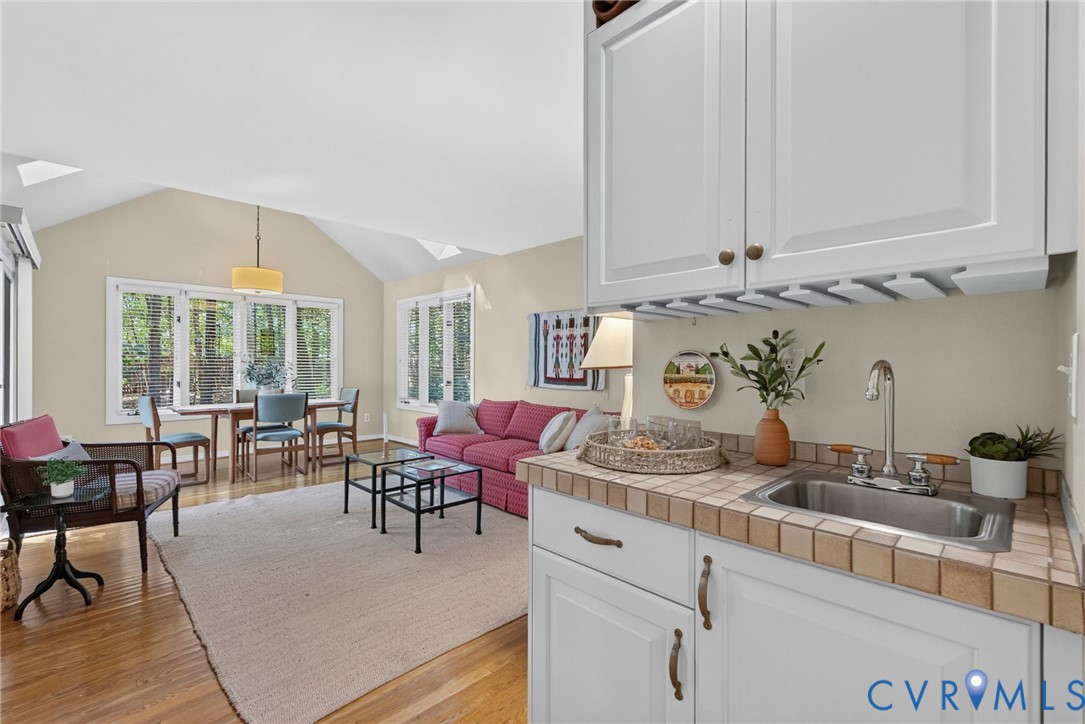Designed for easy entertaining, the wet bar opens to the family room and casual dining area.