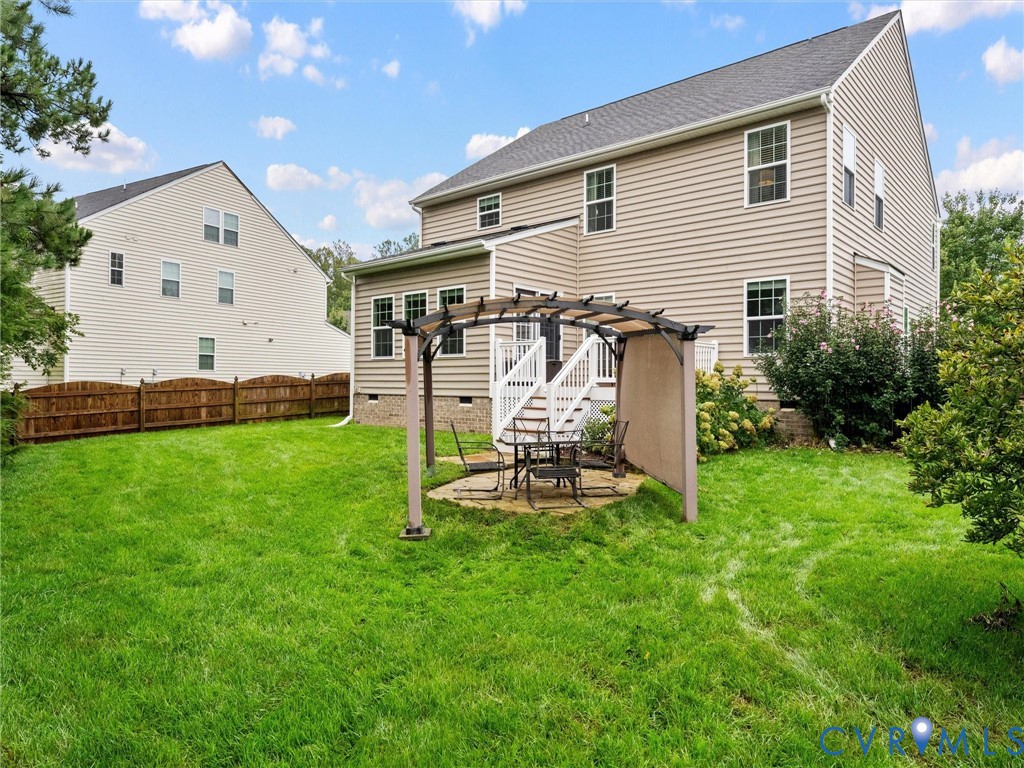 Expansive backyard with a manicured lawn