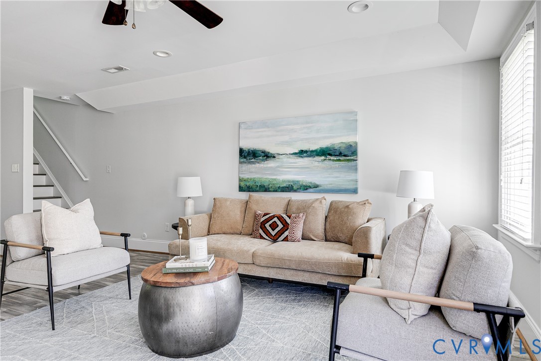 Recessed lighting, wood-finish flooring, ceiling fan, white window blinds