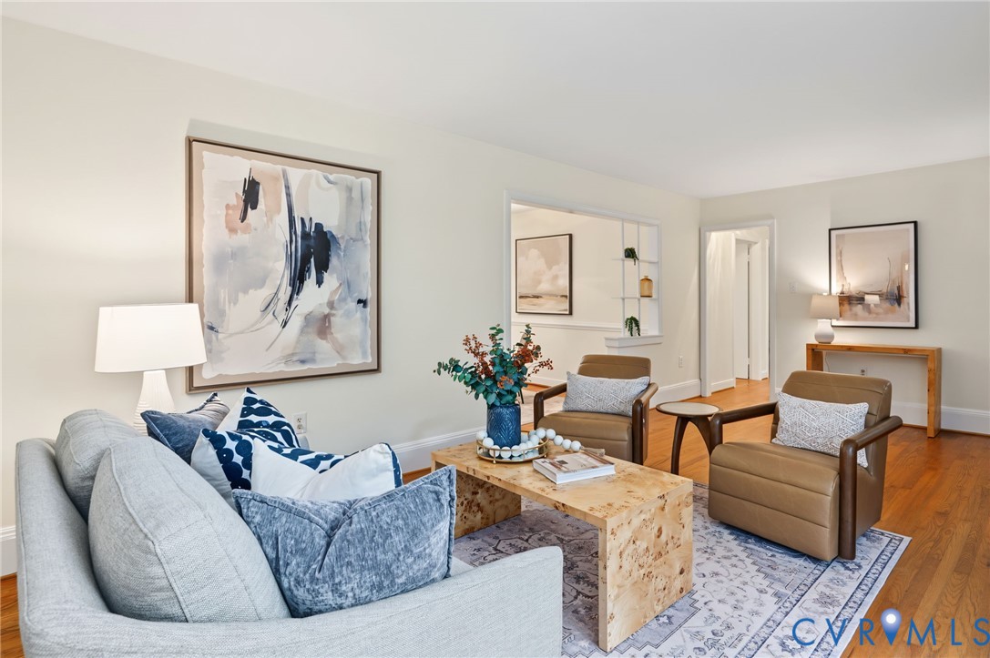 Hardwood flooring throughout, neutral wall paint, and integrated wall shelving Hardwood flooring throughout, neutral wall paint, and integrated wall shelving