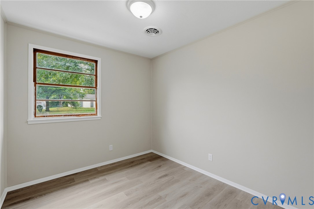 Recessed window with wood-finish framing