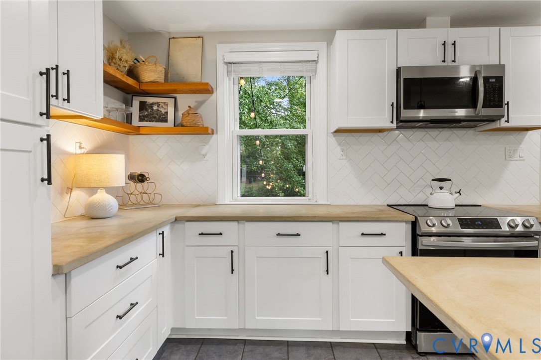 Just enough open storage to provide a lovely accent while maximizing functional storage