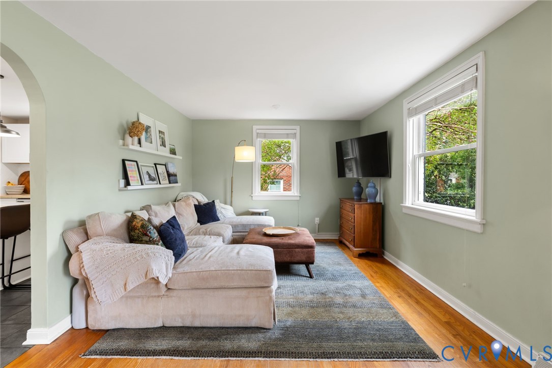 Living room offers plenty of space for cozy movie nights and game nights alike Living room offers plenty of space for cozy movie nights and game nights alike