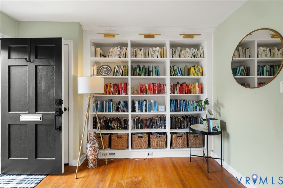 built-in bookshelves at the entrance provide a wow factor and functional storage built-in bookshelves at the entrance provide a wow factor and functional storage