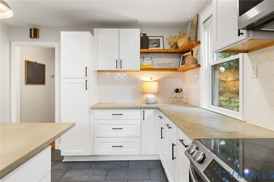and a pantry cabinet built in to the design