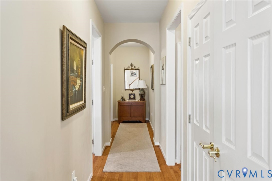 Beautiful Archway Leading to 1st Floor Primary Bedroom Suite
