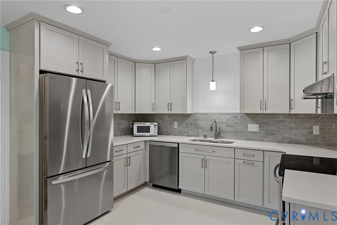 Quartz countertops, new flooring and stainless appliances