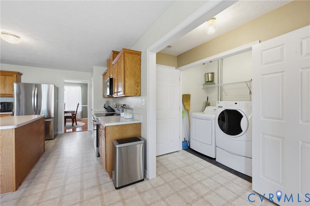 Laundry space cleverly tucked way on the main level