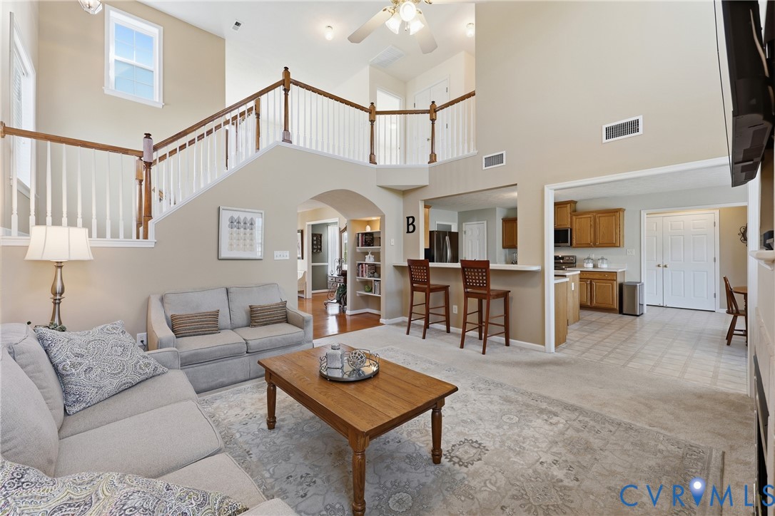 An open living room connects to the kitchen breakfast bar for effortless everyday flow. An open living room connects to the kitchen breakfast bar for effortless everyday flow.