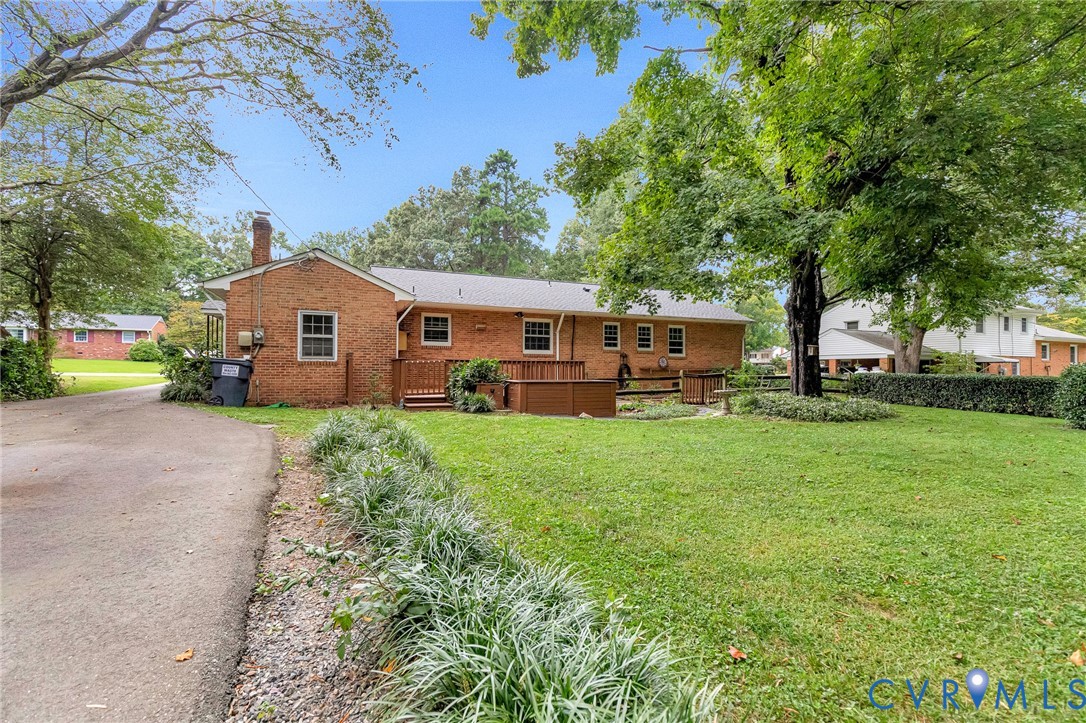 Brick exterior construction with a wood deck