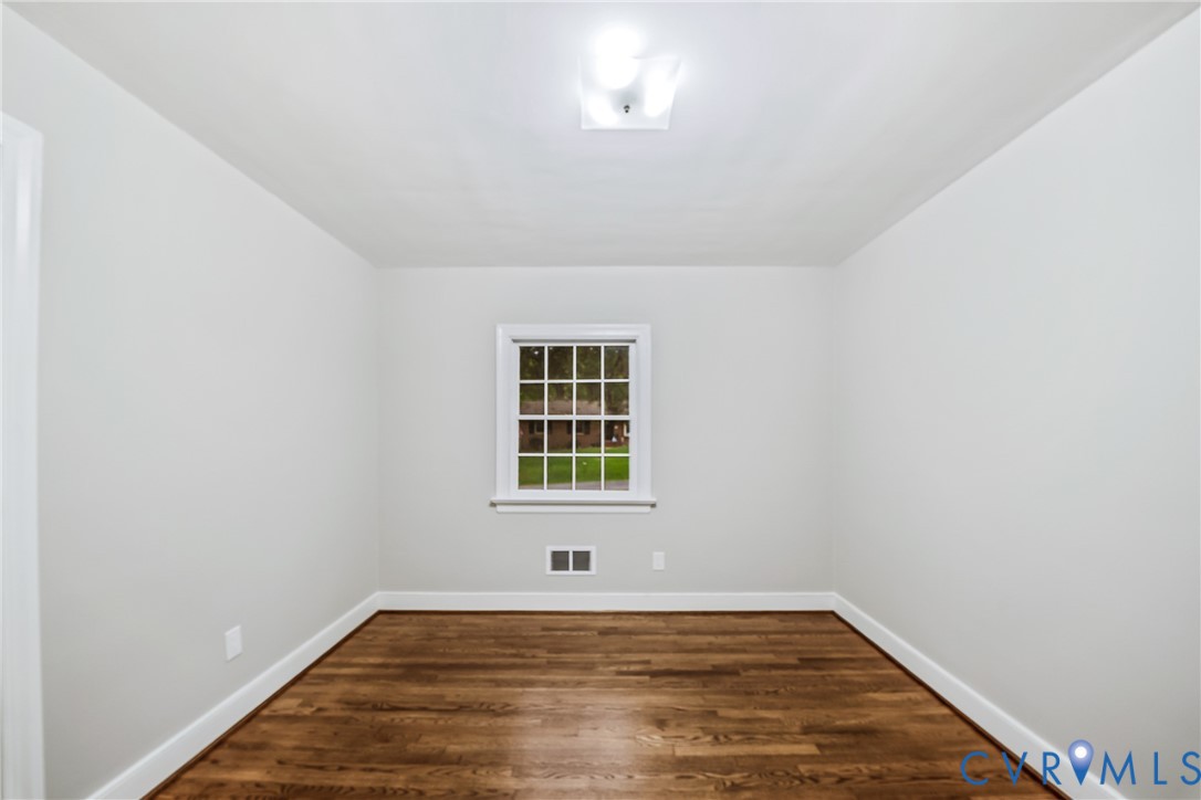 Wood-finish flooring with white trim