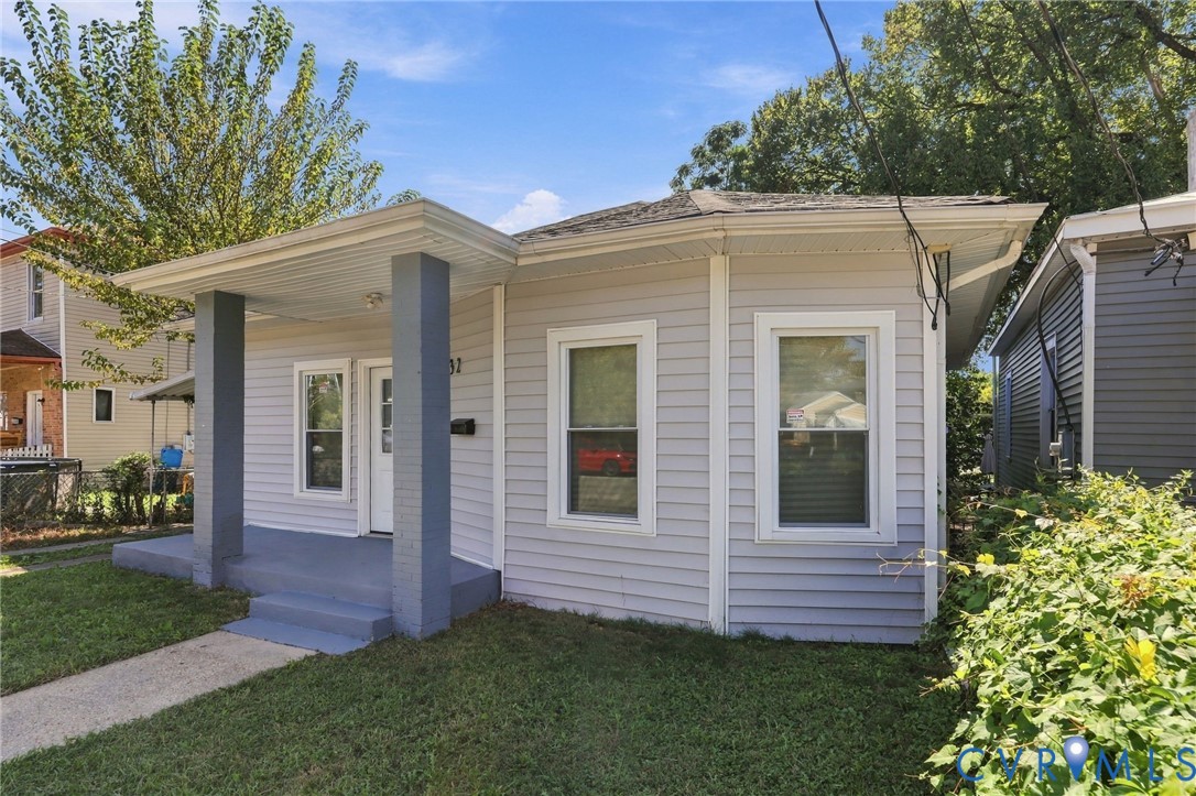 Light gray exterior siding with white trim