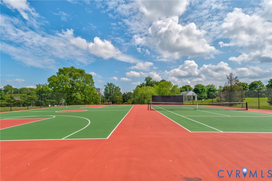 Multi-sport court featuring vibrant red and green surfacing