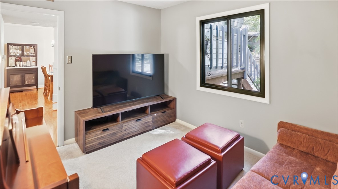 Light-colored wall paint with carpet flooring