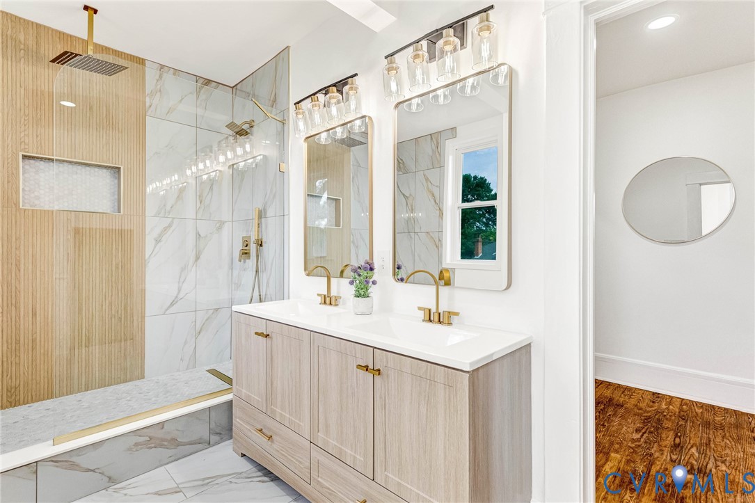 Dual vanity with gold-tone hardware and rectangular mirrors