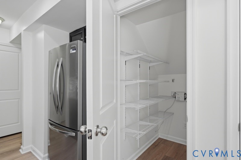Stainless steel refrigerator with double doors and bottom freezer