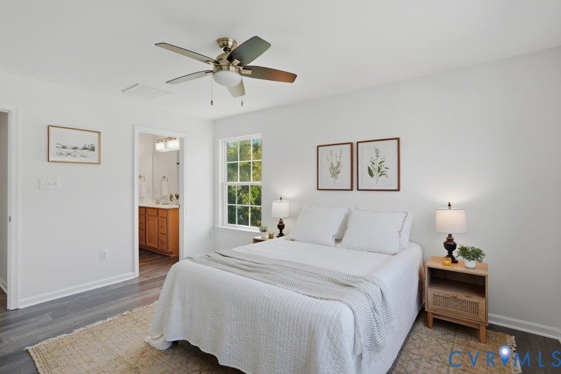 Recessed lighting, ceiling fan with integrated light, wood-finish flooring, and a window with natural light