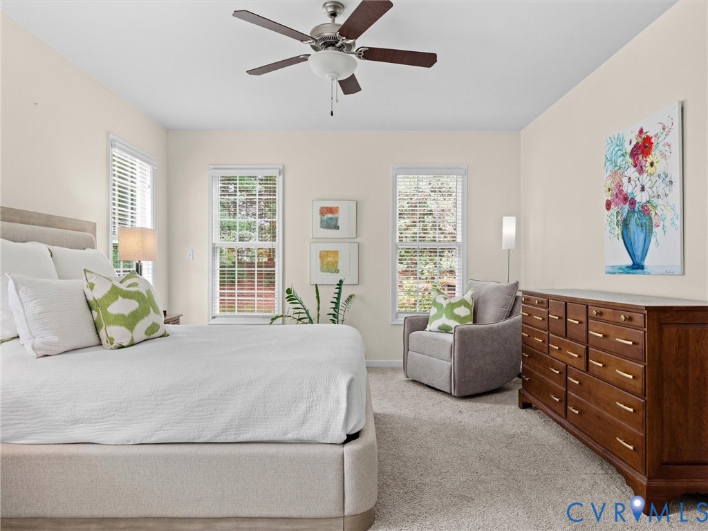 Textured carpeting and neutral wall tones create a serene atmosphere